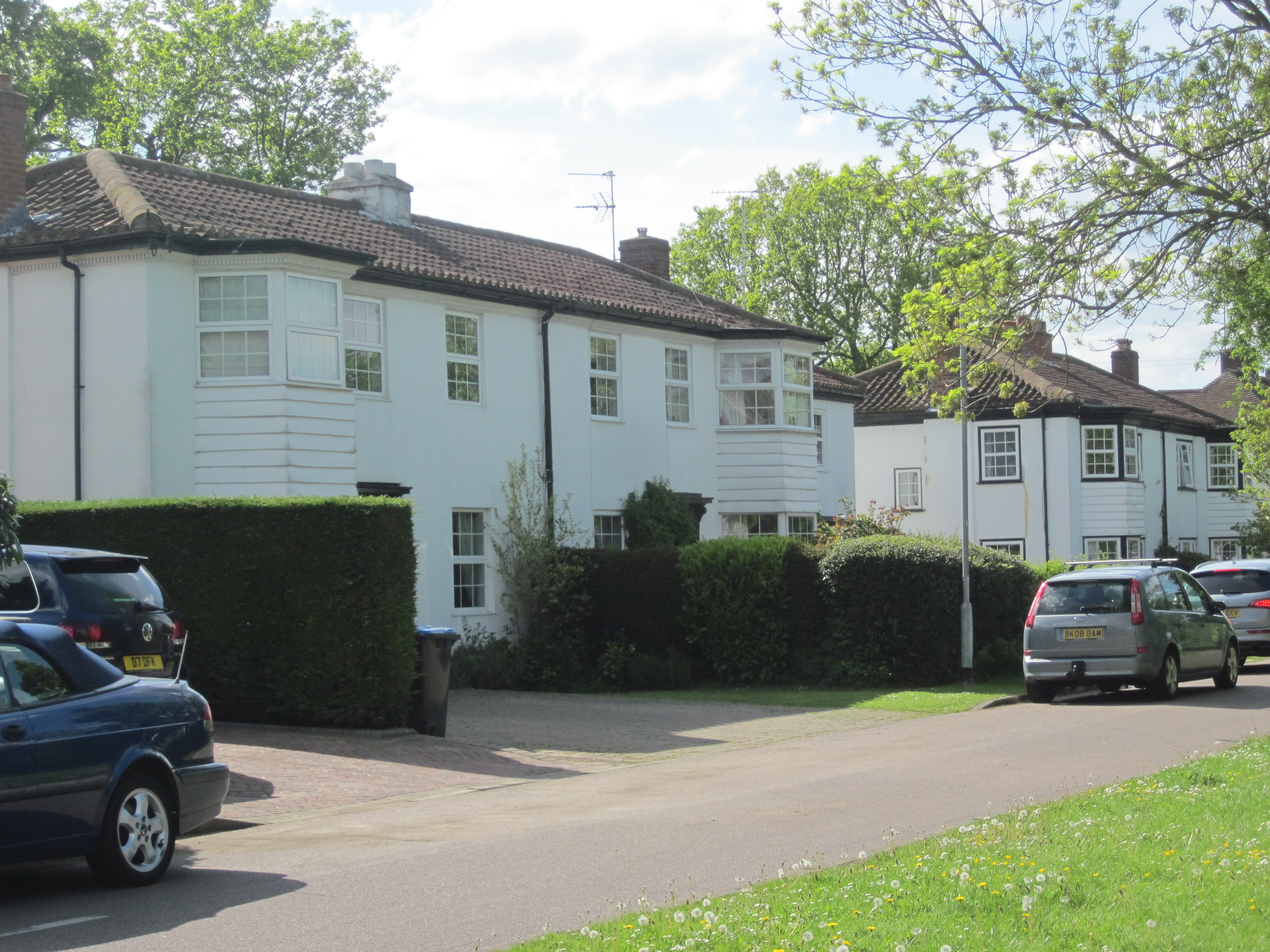 Pretty homes, shame about the cars