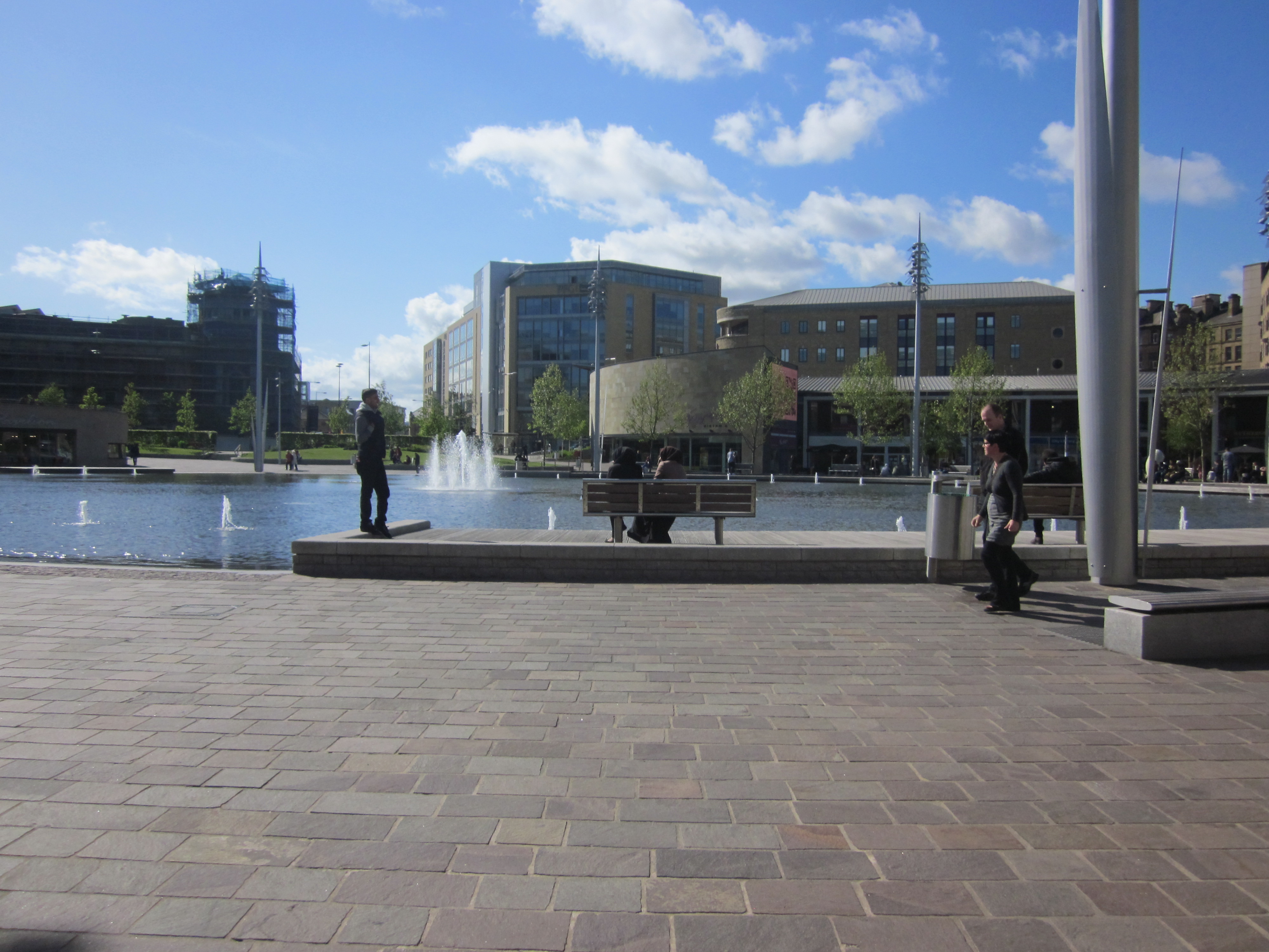 A new urban realm scheme including the mirror pond in the city centre symbolises the changes that are underway