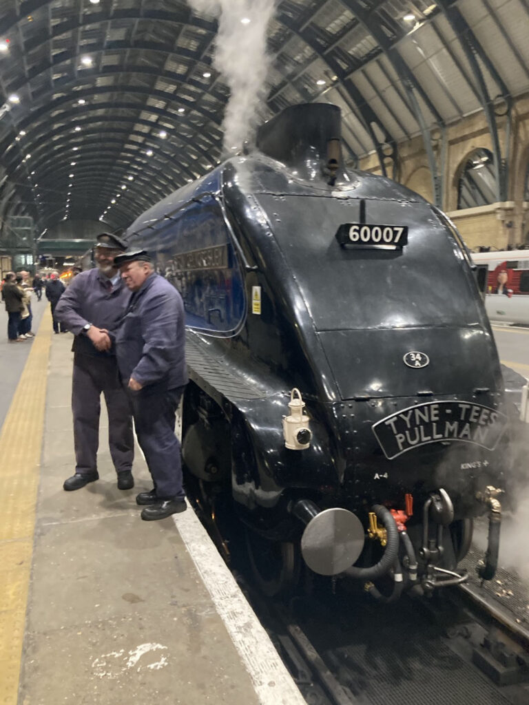 Bittern locomotive waiting at a Kings Cross platform